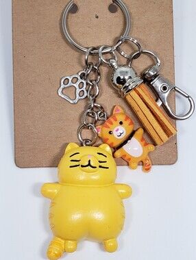 Handmade painted resin orange tabby cat paw keychain